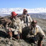 3 eagle hunters/ Ulgii