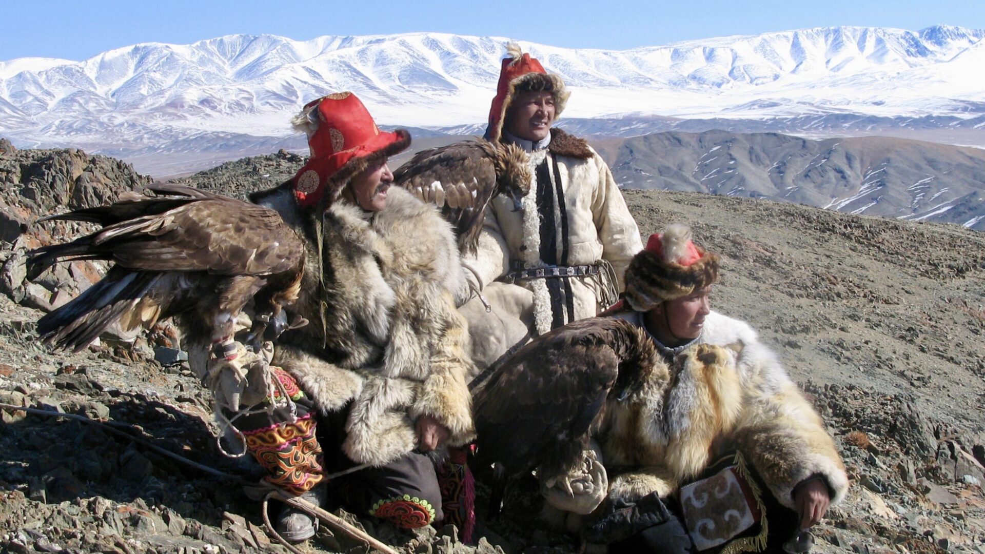 3 eagle hunters/ Ulgii